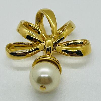 Lot 115: Three Nolan Miller Pendants
