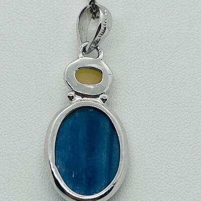 Lot 116 Sterling silver Opal and blue Kyanite pendant marked 925 India YS on the bail