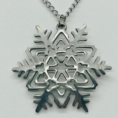 Lot 117: Reed and Barton Pewter Snowflake Pendant