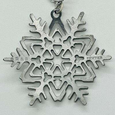 Lot 117: Reed and Barton Pewter Snowflake Pendant