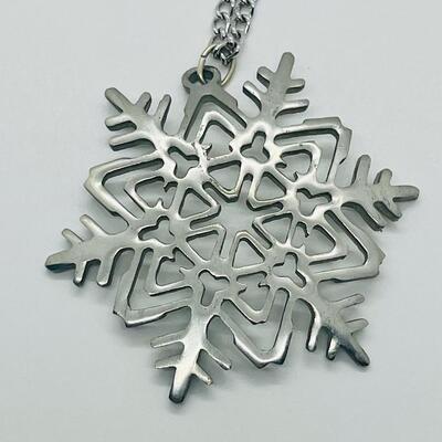 Lot 117: Reed and Barton Pewter Snowflake Pendant