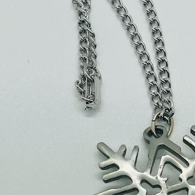 Lot 117: Reed and Barton Pewter Snowflake Pendant