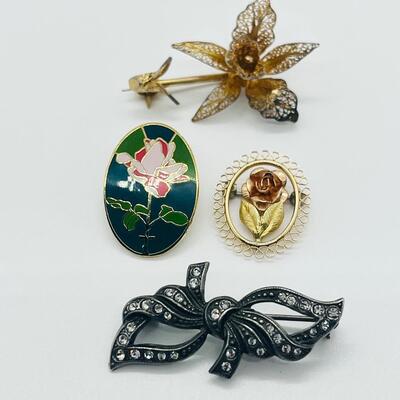 Lot 121: Krementz Two-Tone Flower Pin, 925 Bow with CZ's and More
