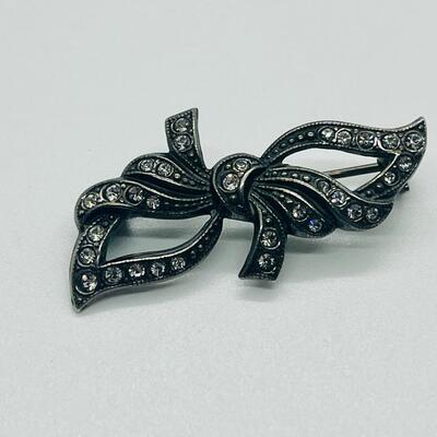 Lot 121: Krementz Two-Tone Flower Pin, 925 Bow with CZ's and More
