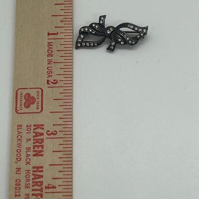 Lot 121: Krementz Two-Tone Flower Pin, 925 Bow with CZ's and More