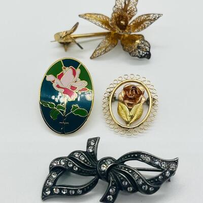 Lot 121: Krementz Two-Tone Flower Pin, 925 Bow with CZ's and More