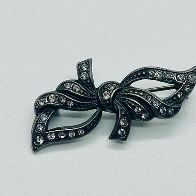Lot 121: Krementz Two-Tone Flower Pin, 925 Bow with CZ's and More