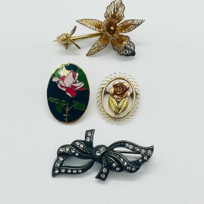 Lot 121: Krementz Two-Tone Flower Pin, 925 Bow with CZ's and More