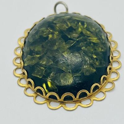 Lot 122: Three Costume Pendants