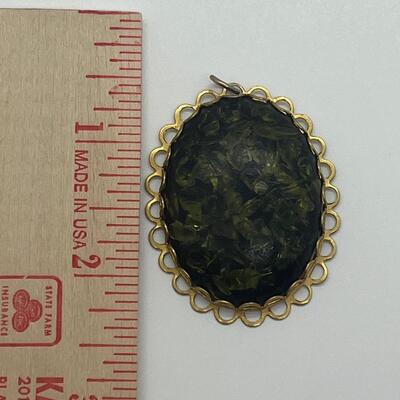 Lot 122: Three Costume Pendants