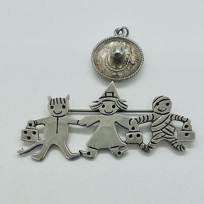 Lot 123: 925 Mexico Sombrero Pendant/Charm & 925 Mexico Halloween Trick-or-Treaters Pendant/Brooch