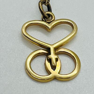 Lot 124:  2.7g  14k Love, Faith and Unity Pendant Necklace