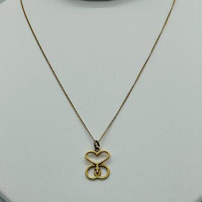 Lot 124:  2.7g  14k Love, Faith and Unity Pendant Necklace