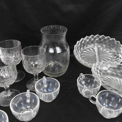 14 pc Crystal.  8 cups, 2 serving plates, 1 Pitcher and 3 wine glasses