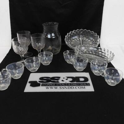 14 pc Crystal.  8 cups, 2 serving plates, 1 Pitcher and 3 wine glasses