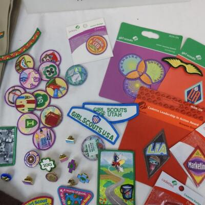 Lot of Assorted Girl Scout Pins, Badges, and Sash