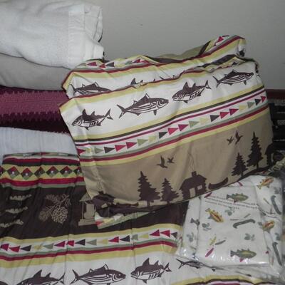 LOT 210  METAL BED FRAME AND FISH BEDDING