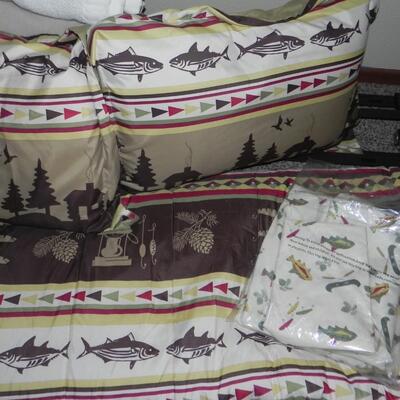 LOT 210  METAL BED FRAME AND FISH BEDDING
