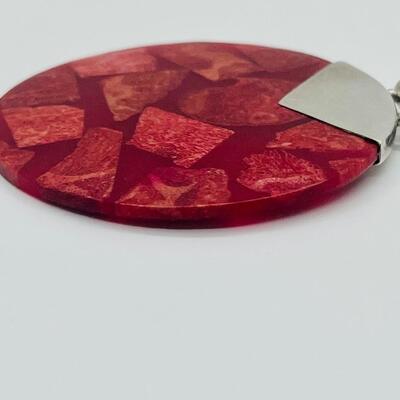 Lot 128: 925 Sterling & Rusty Red Pendant