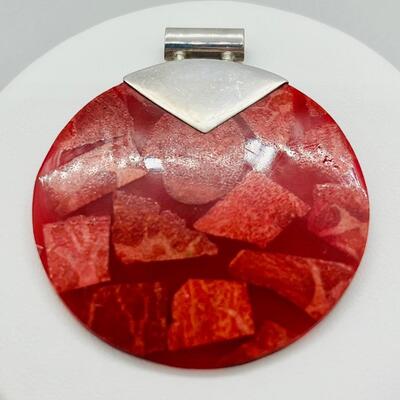 Lot 128: 925 Sterling & Rusty Red Pendant