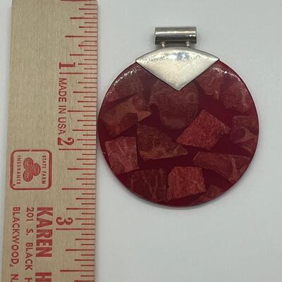 Lot 128: 925 Sterling & Rusty Red Pendant