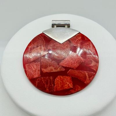 Lot 128: 925 Sterling & Rusty Red Pendant