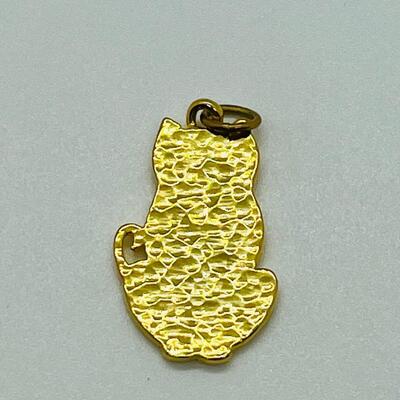 Lot 130: 3 crystal silvertone pendants and a goldtone Kitty