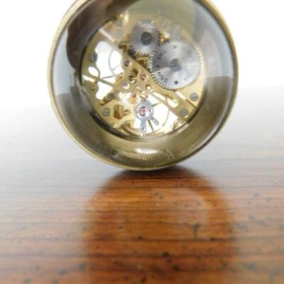 Mantle Top Time Piece with Clock Works inside Bubble Glass and Brass Ring Marked 'The King'