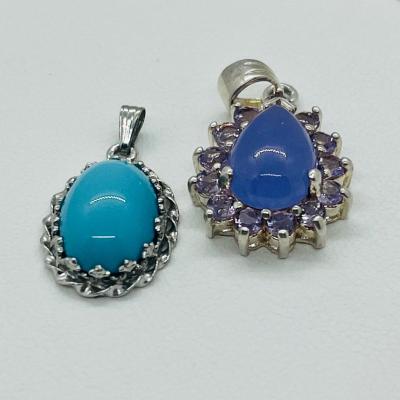Lot 134: Two Sterling & Gemstone Pendants
