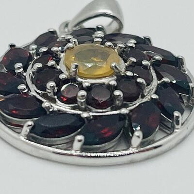 Lot 136: Sterling Pendant with Garnets & Lemon Citrine Center
