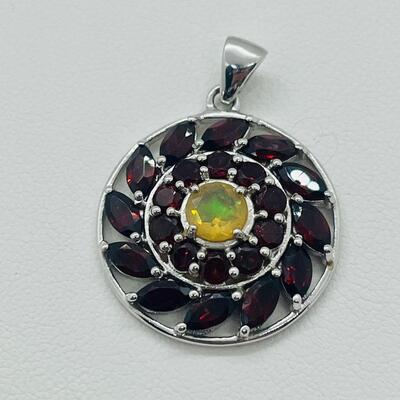 Lot 136: Sterling Pendant with Garnets & Lemon Citrine Center