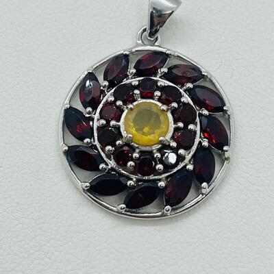 Lot 136: Sterling Pendant with Garnets & Lemon Citrine Center