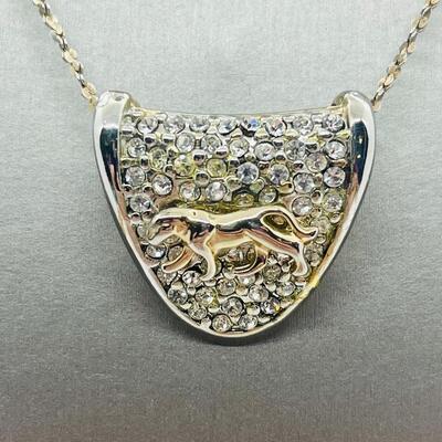 Lot 139: Silvertone Slider Pendant Covered in CZ's with Goldtone Panther