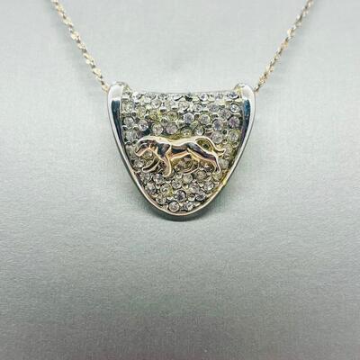Lot 139: Silvertone Slider Pendant Covered in CZ's with Goldtone Panther
