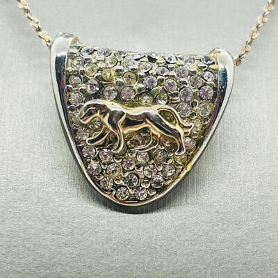 Lot 139: Silvertone Slider Pendant Covered in CZ's with Goldtone Panther