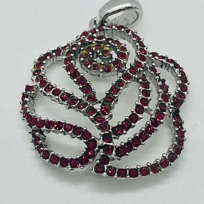 Lot 140: NF 925 Thailand Red Rose Pendant of Garnet Chips
