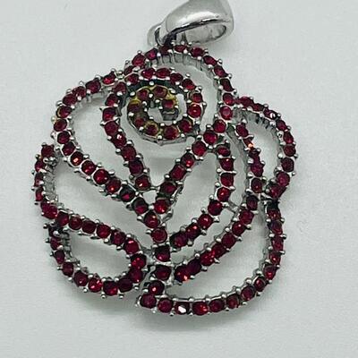 Lot 140: NF 925 Thailand Red Rose Pendant of Garnet Chips
