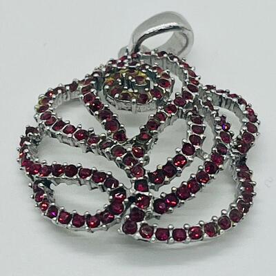 Lot 140: NF 925 Thailand Red Rose Pendant of Garnet Chips