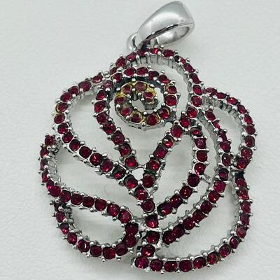 Lot 140: NF 925 Thailand Red Rose Pendant of Garnet Chips