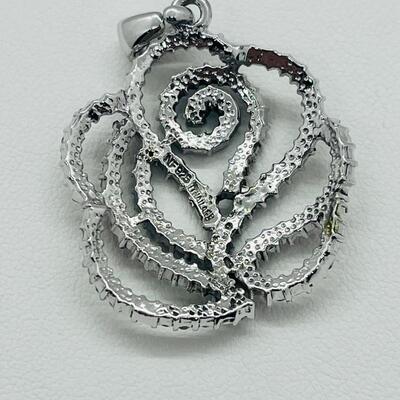 Lot 140: NF 925 Thailand Red Rose Pendant of Garnet Chips