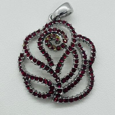 Lot 140: NF 925 Thailand Red Rose Pendant of Garnet Chips