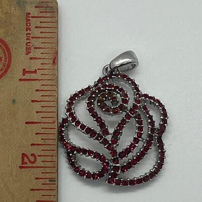 Lot 140: NF 925 Thailand Red Rose Pendant of Garnet Chips