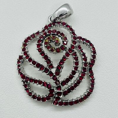 Lot 140: NF 925 Thailand Red Rose Pendant of Garnet Chips