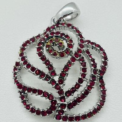 Lot 140: NF 925 Thailand Red Rose Pendant of Garnet Chips