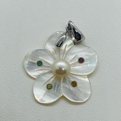 Lot 141: Mother of Pearl Flower with Cultured Pearl Center, Inset Gemstones, & Sterling Bail