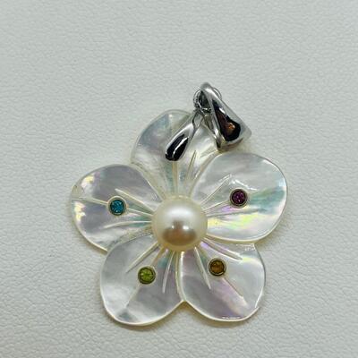 Lot 141: Mother of Pearl Flower with Cultured Pearl Center, Inset Gemstones, & Sterling Bail