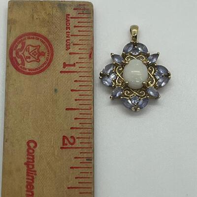 Lot 142: 10k STS Opal & Tanzanite in Yellow Gold Pendant