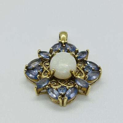 Lot 142: 10k STS Opal & Tanzanite in Yellow Gold Pendant