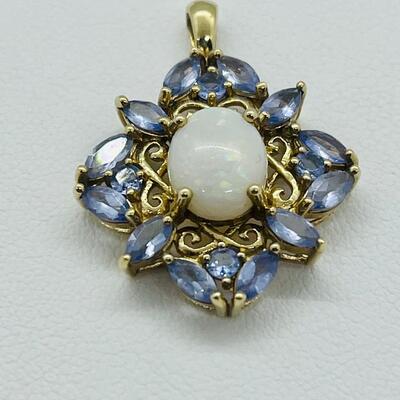 Lot 142: 10k STS Opal & Tanzanite in Yellow Gold Pendant