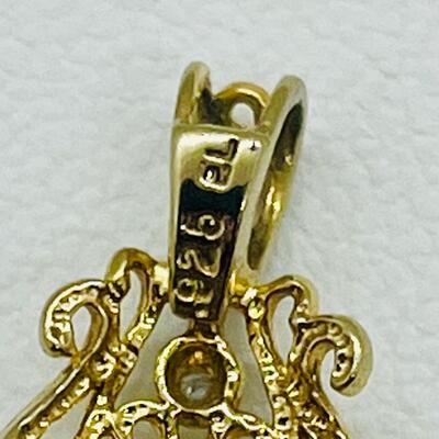 Lot 149: 925EL Gold Vermeil Garnet Pendant with Diamond Chip
